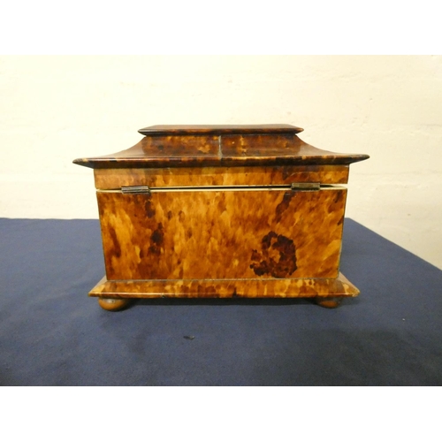 320 - Tortoiseshell and ivory inlaid tea caddy, circa early 19th century, of pagoda shape, the hinged top ... 