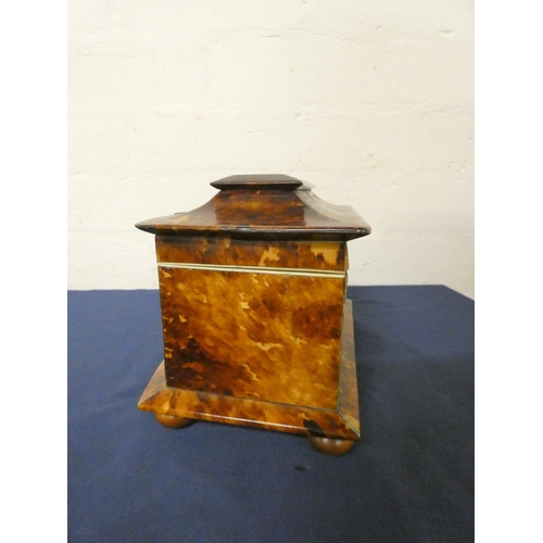 320 - Tortoiseshell and ivory inlaid tea caddy, circa early 19th century, of pagoda shape, the hinged top ... 