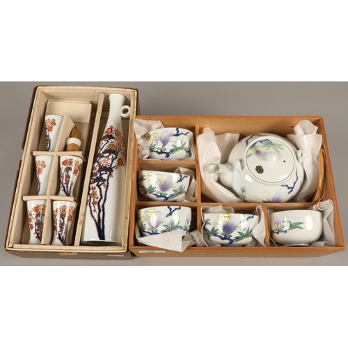 28 - A boxed Japanese sake set, and a boxed Arita tea set