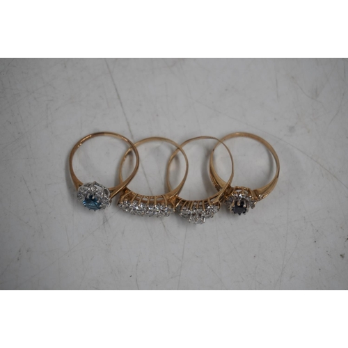 415 - Three 9ct gold white stone and gem set dress rings, gross 5.6g, together with a yellow metal gem set... 