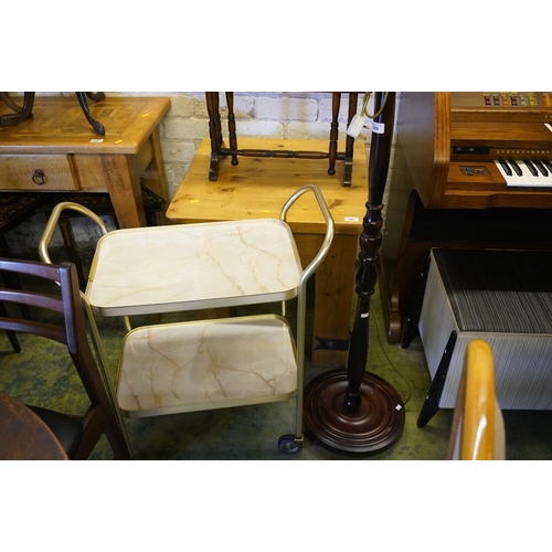 589 - Turned mahogany standard lamp and a hostess trolley.