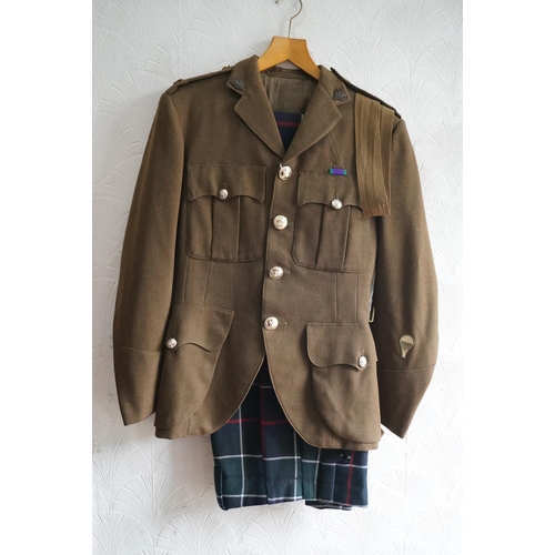 1735 - British army uniform, a khaki green jacket by Jardine and Sons of Edinburgh, having interior pocket ... 