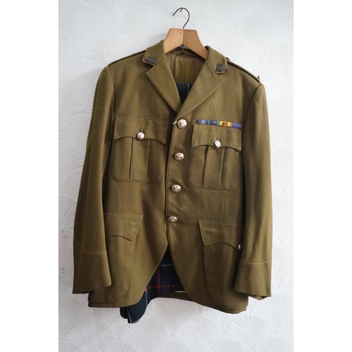 1737 - British army uniform, a khaki green jacket by Jardine and Sons of Edinburgh, having interior pocket ... 