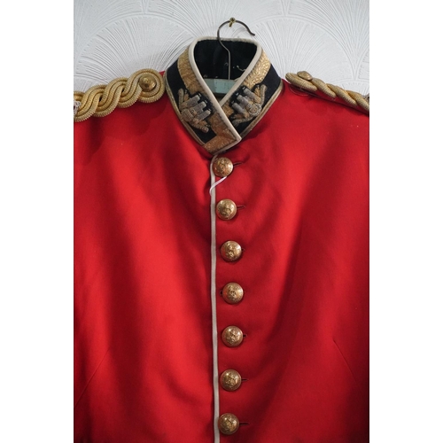 1743 - British army uniform, a red doublet jacket having Hawkes and Co brass Kings Own Scottish Borderers K... 