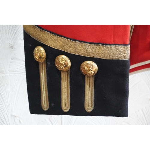 1743 - British army uniform, a red doublet jacket having Hawkes and Co brass Kings Own Scottish Borderers K... 