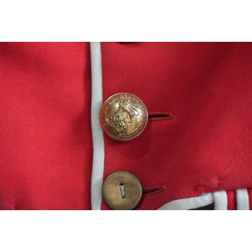 1743 - British army uniform, a red doublet jacket having Hawkes and Co brass Kings Own Scottish Borderers K... 