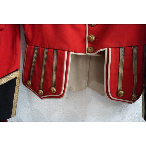 1743 - British army uniform, a red doublet jacket having Hawkes and Co brass Kings Own Scottish Borderers K... 