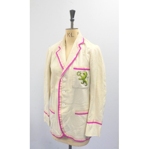 307 - A vintage Cambridge boating/college blazer by Bodger and Co Outfitters in cream with purple and pink... 