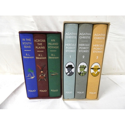 144 - Folio Society.  Hercule Poirot Stories, 3 vols. in slip case; also R. L. Stevenson, Travels, 3 vols.... 