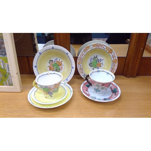 206 - Scottish Macmerry Pottery, a Scottish Pottery milk jug and a Midwinter saucer.