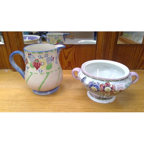 213 - Three Macmerry Scottish Art pottery plates and a sugar bowl, and a china jug.