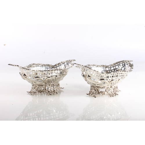 57 - Pair of pierced silver bon bon dishes of boat shape by William Comyns & Sons, London 1889, 291g ... 