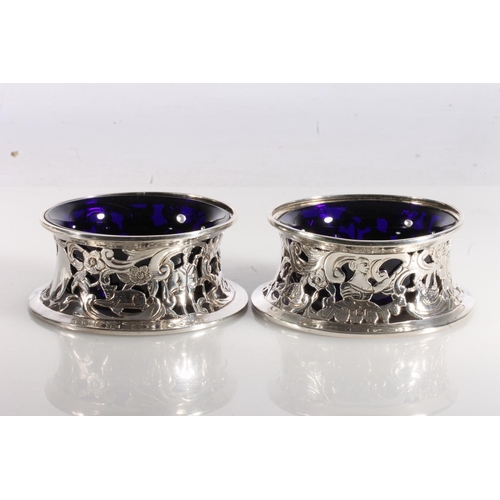 59 - Pair of pierced sugar bowls of potato ring form by Pairpoint Brothers, London 1912, 215g, with blue ... 