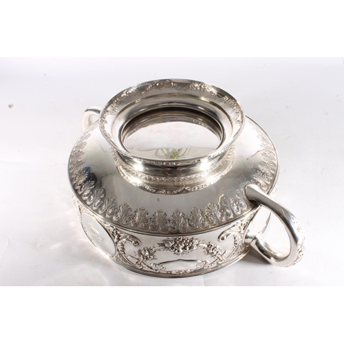 62 - Victorian silver twin handled punch bowl with gilded interior and embossed ornate designs of garland... 