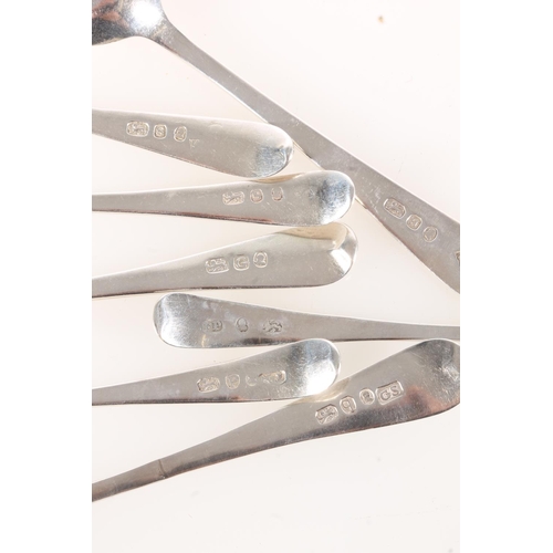 75 - Seven non-matching silver teaspoons with bright cut borders, various makers, 75g gross.