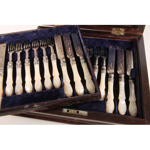 106 - Set of twelve Victorian silver and mother-of-pearl handled fruit knives and forks by Martin, Hall &a... 