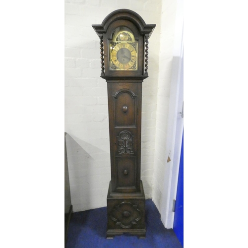 516 - 1930s oak cased grandmother clock with brass ''Tempus Fugit'' dial, the case boasting stylised flora... 