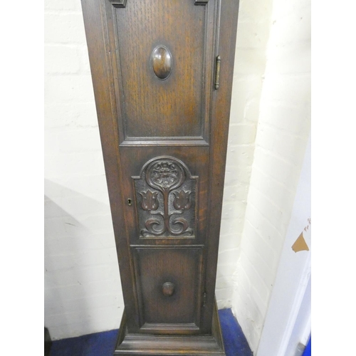 516 - 1930s oak cased grandmother clock with brass ''Tempus Fugit'' dial, the case boasting stylised flora... 