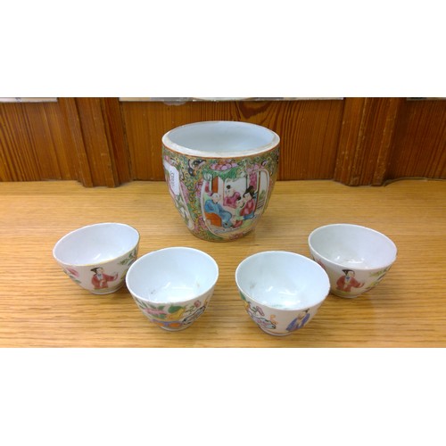 229 - Chinese Canton famille rose vase and four porcelain tea bowls.