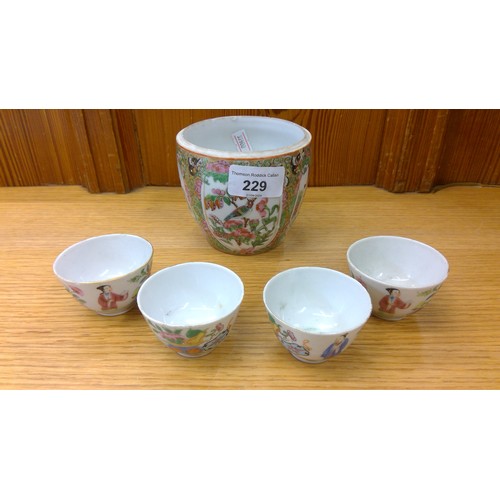 229 - Chinese Canton famille rose vase and four porcelain tea bowls.