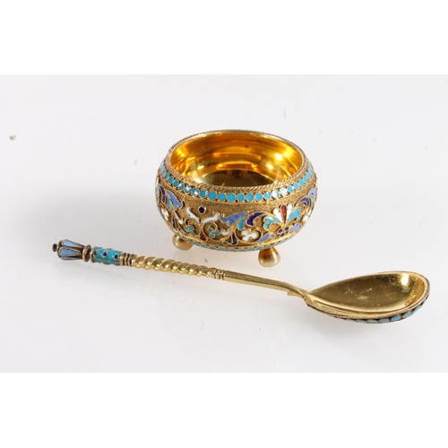 144 - Russian 84zl grade silver gilt and enamel salt cellar of hemi spherical form raised on three ball fe... 