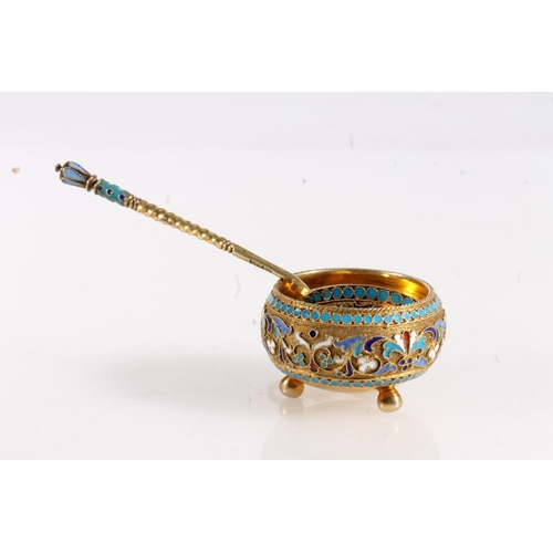 144 - Russian 84zl grade silver gilt and enamel salt cellar of hemi spherical form raised on three ball fe... 