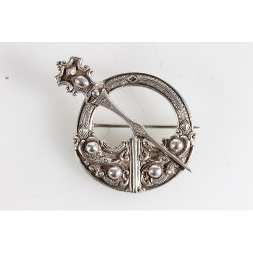 155 - Unmarked white metal Scottish penannular brooch of large proportions and typical form, 58g gross.