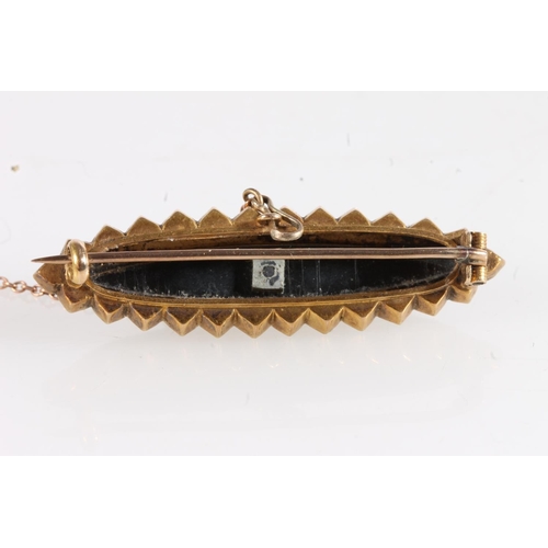 181 - Victorian unmarked yellow metal mourning brooch of navette shape set with black onyx and seed pearls... 