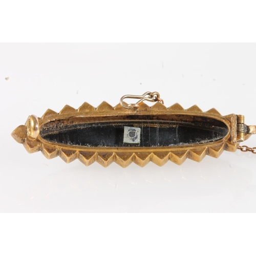 181 - Victorian unmarked yellow metal mourning brooch of navette shape set with black onyx and seed pearls... 