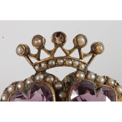 182 - 9ct gold amethyst and seed pearl brooch in the form of crowned double love hearts, stamped 9ct, 6.1g... 