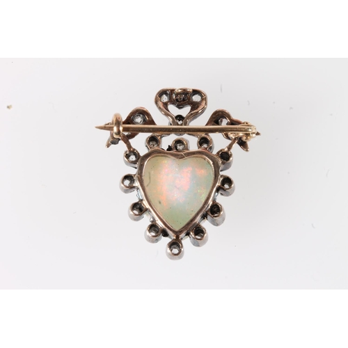 187 - Unmarked gold plated white metal opal and rose cut diamond brooch of heart and ribbon bow form, 3.2g... 