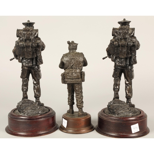 44 - Three bronzed figures of Scottish soldiers on wooden bases, including two The Black Watch (RHR) 1/51... 