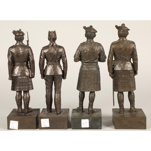 45 - Four bronzed figurines of military Scotsmen(4)