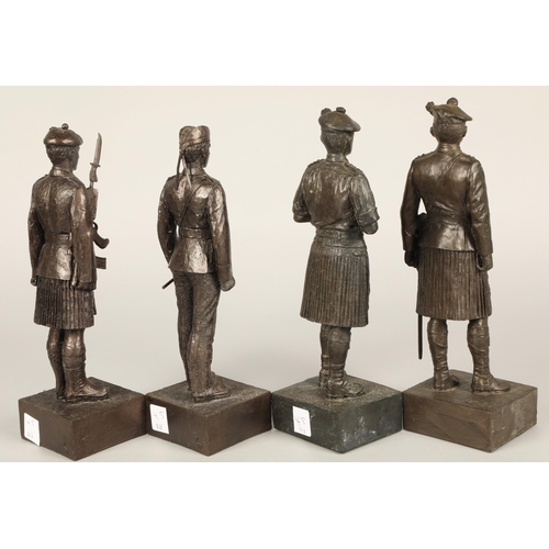 45 - Four bronzed figurines of military Scotsmen(4)