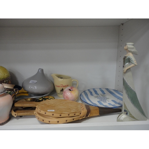 100 - Two shelves of sundry ceramics to include whisky jug, figures, dishes and bellows etc.