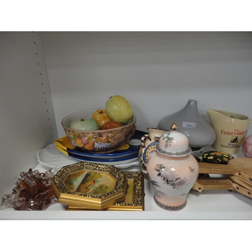 100 - Two shelves of sundry ceramics to include whisky jug, figures, dishes and bellows etc.