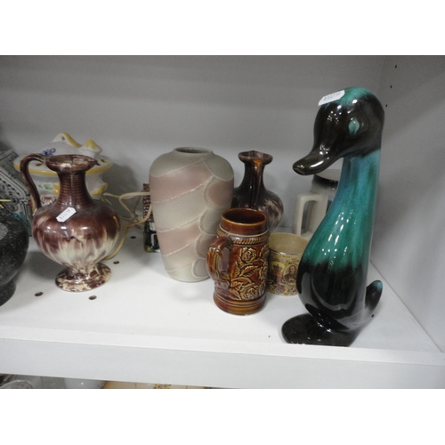 102 - Assorted figures to include oriental figures, vase, mortar and pestle, tankards, boxes etc (two shel... 