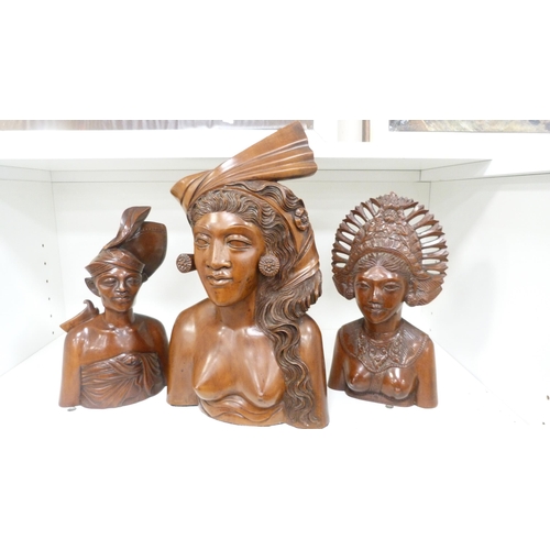 110A - Three African hardwood busts.