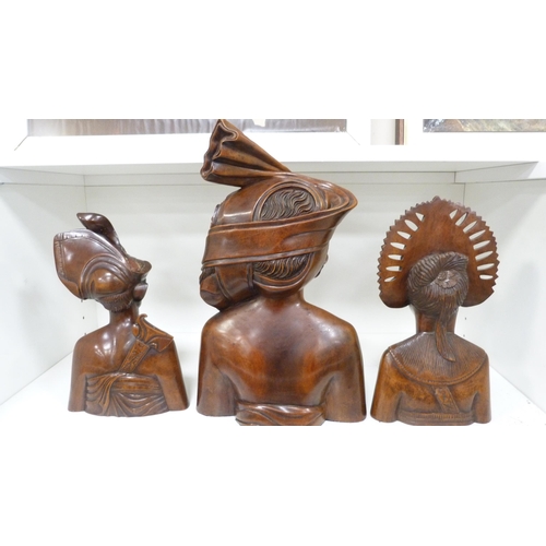 110A - Three African hardwood busts.