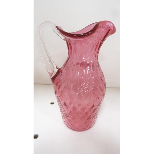 110B - Cranberry glass jug and sugar sifter, with three tinted crystal cranberry glasses. (5)