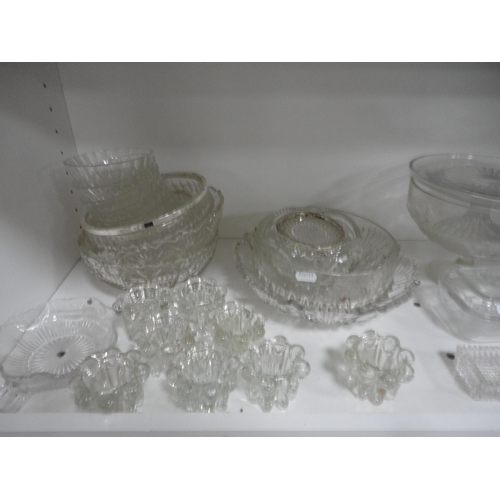 112 - Two shelves of assorted glass to include bowls, basket etc with Metamec mantel clock.