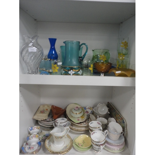 116 - Two shelves with art glass vase, water set, crystal jugs, art glass dish and miscellaneous china etc... 