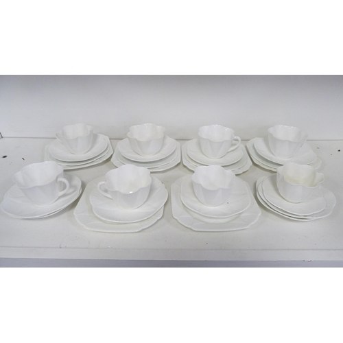 117A - Part white glazed tea set by Shelley.