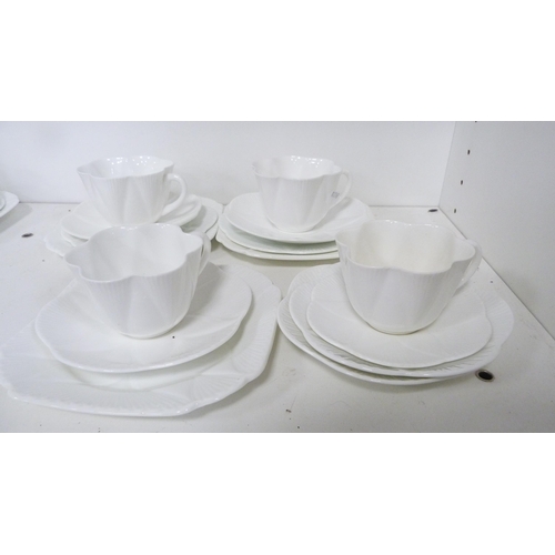 117A - Part white glazed tea set by Shelley.