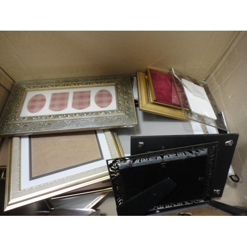 136 - Box of sundry picture frames with boxed Colditz game and tea trays.