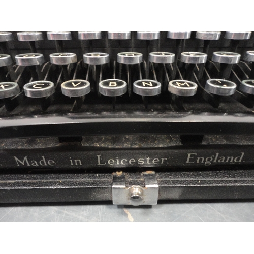 137 - Boxed Imperial typewriter with attaché briefcase and box of wall brackets.