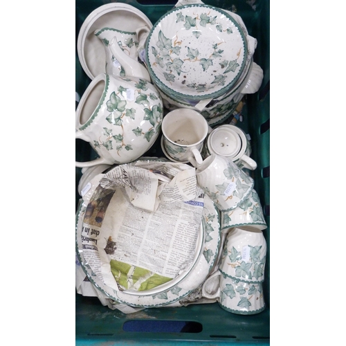 14 - Two cartons containing a large quantity of leaf-decorated table and dinnerwares.