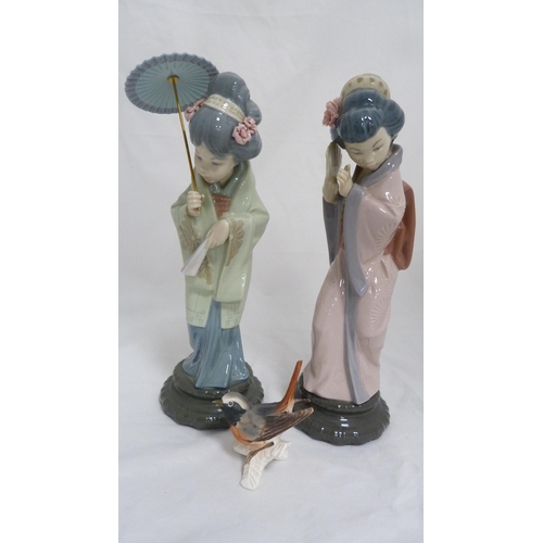 152 - Two Lladro figures modelled as Japanese Geisha girls, with Goebel bird figure. (3)