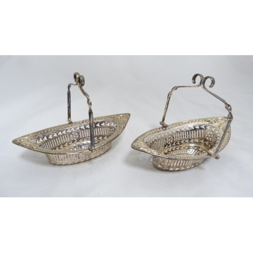 155 - Pair of EP boat shaped bon bon baskets with handles.