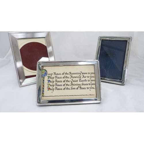 156 - Two silver mounted photo frames with plated mounted photo frame. (3)